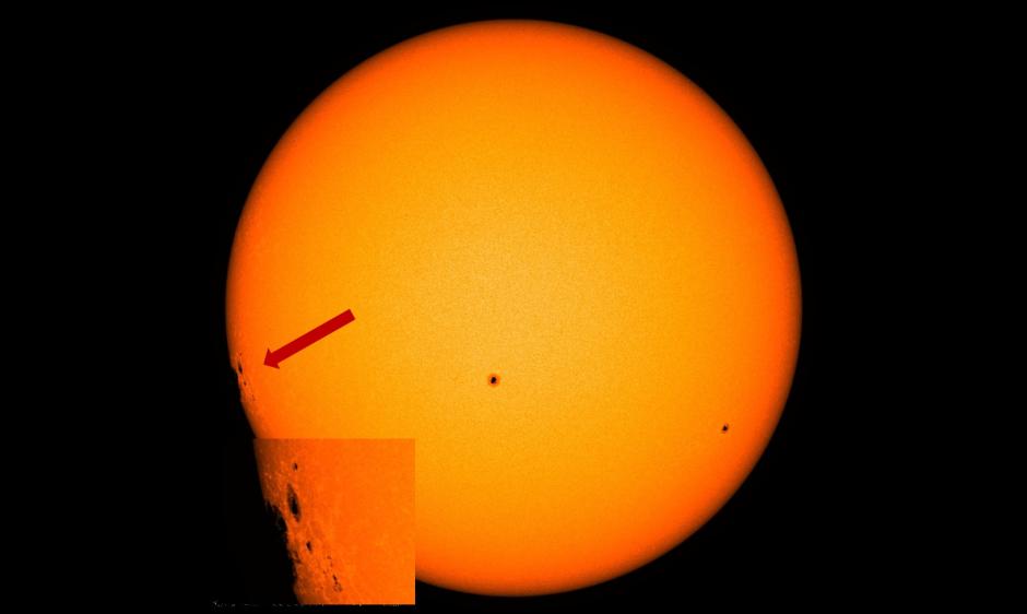 Picture of sunspots rotating onto the visible disk of the Sun 