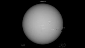 Solar image with sunspots annotated